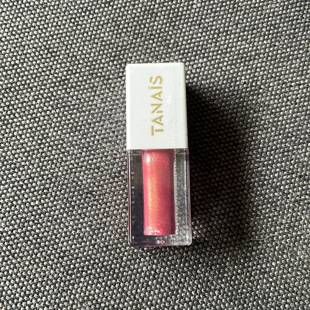 Tanais Lip Gloss- Brand New still sealed plumeria petals color